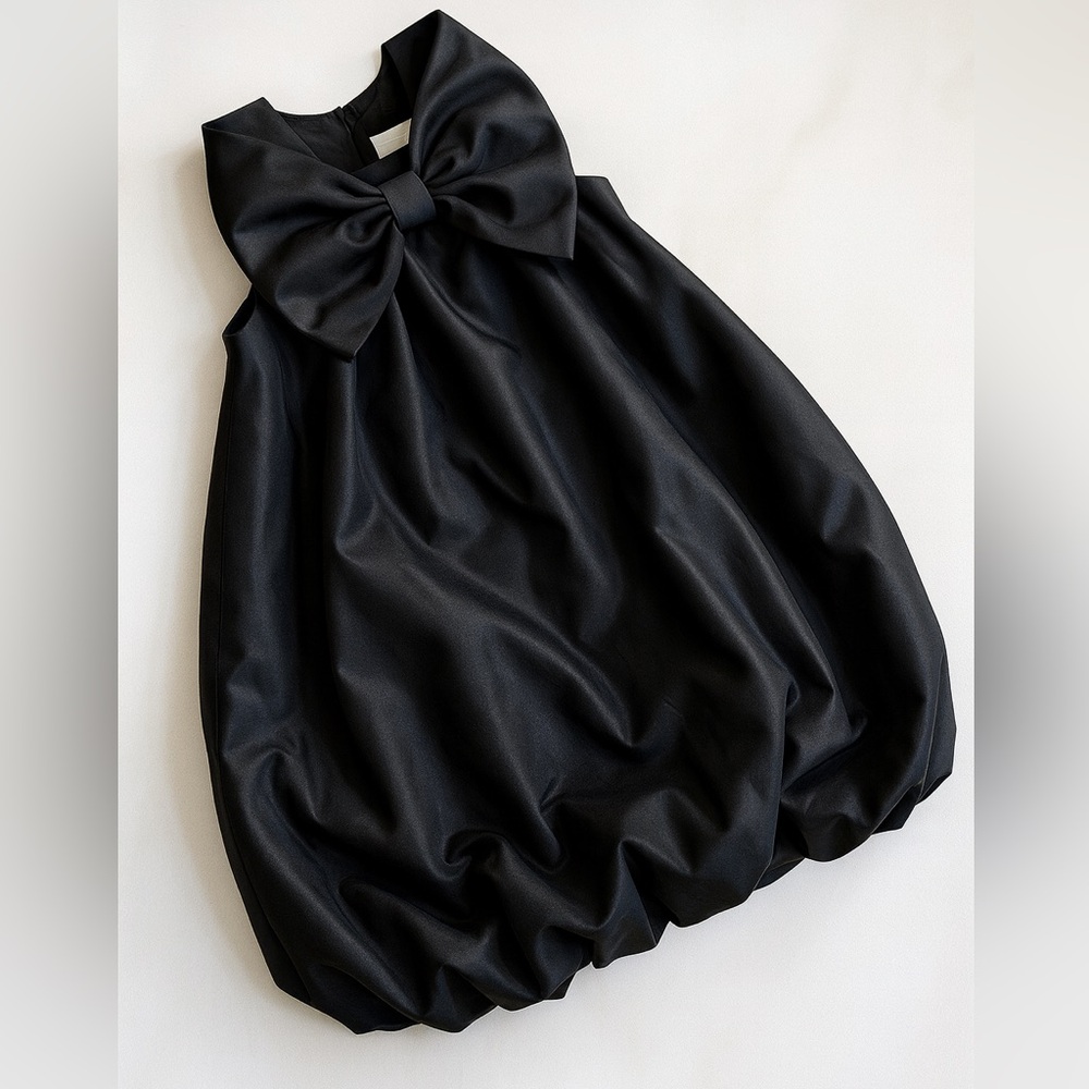H&M black dress is bow size 7-8 years (Canadian) worn once!